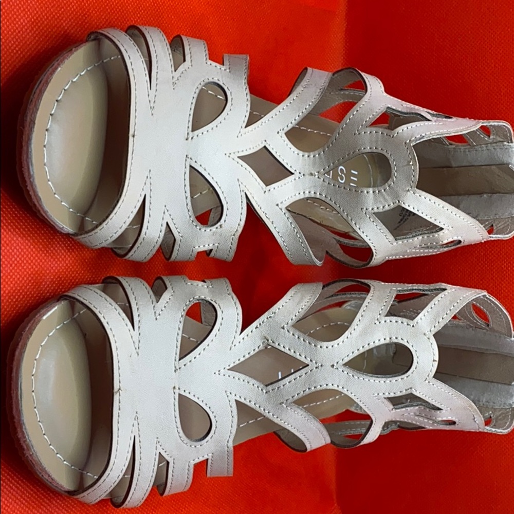 Cream colored sandal with mini wedge heal